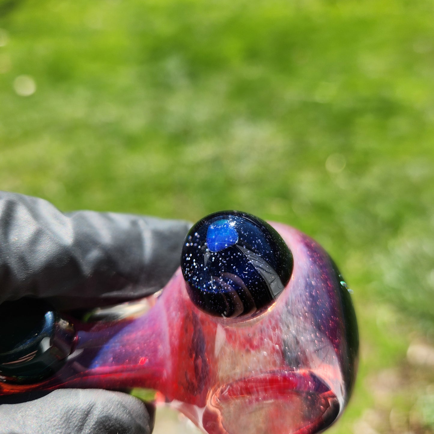 Hellstar Relics “Prism” Glass Spoon Pipe – Phoenix Red Pink w/ Bluestar Dust Lens, Galaxy Opal Core & Green Cylinder Accents