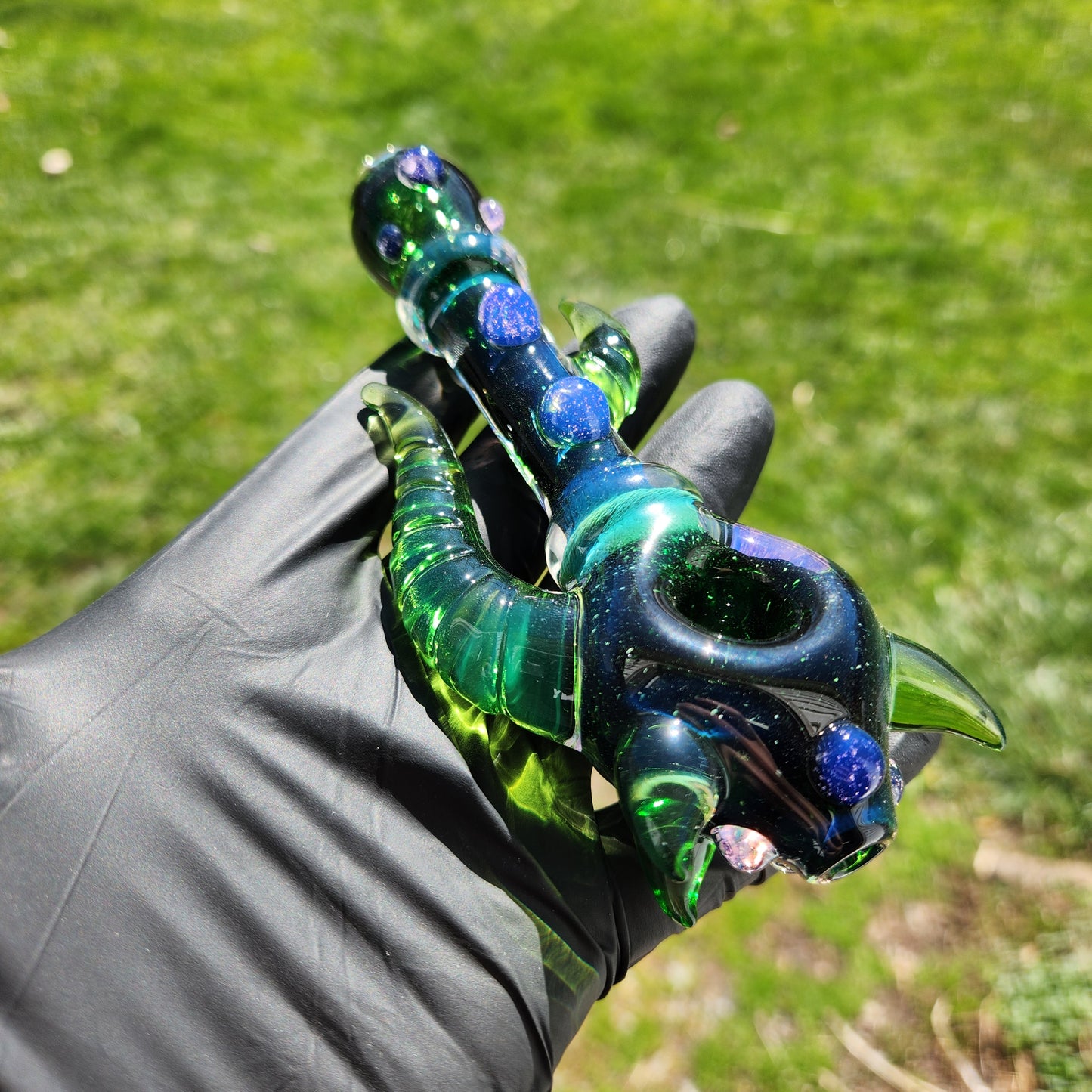 Hellstar Relics “Nebula Worm” Glass Spoon Pipe – Experimental Green w/ Multi Horn Front, Carved Side Horns & Purple Slime Accents