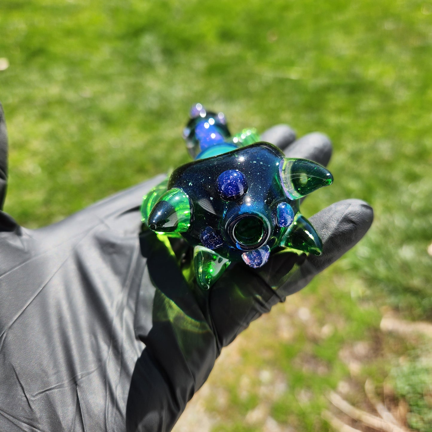Hellstar Relics “Nebula Worm” Glass Spoon Pipe – Experimental Green w/ Multi Horn Front, Carved Side Horns & Purple Slime Accents