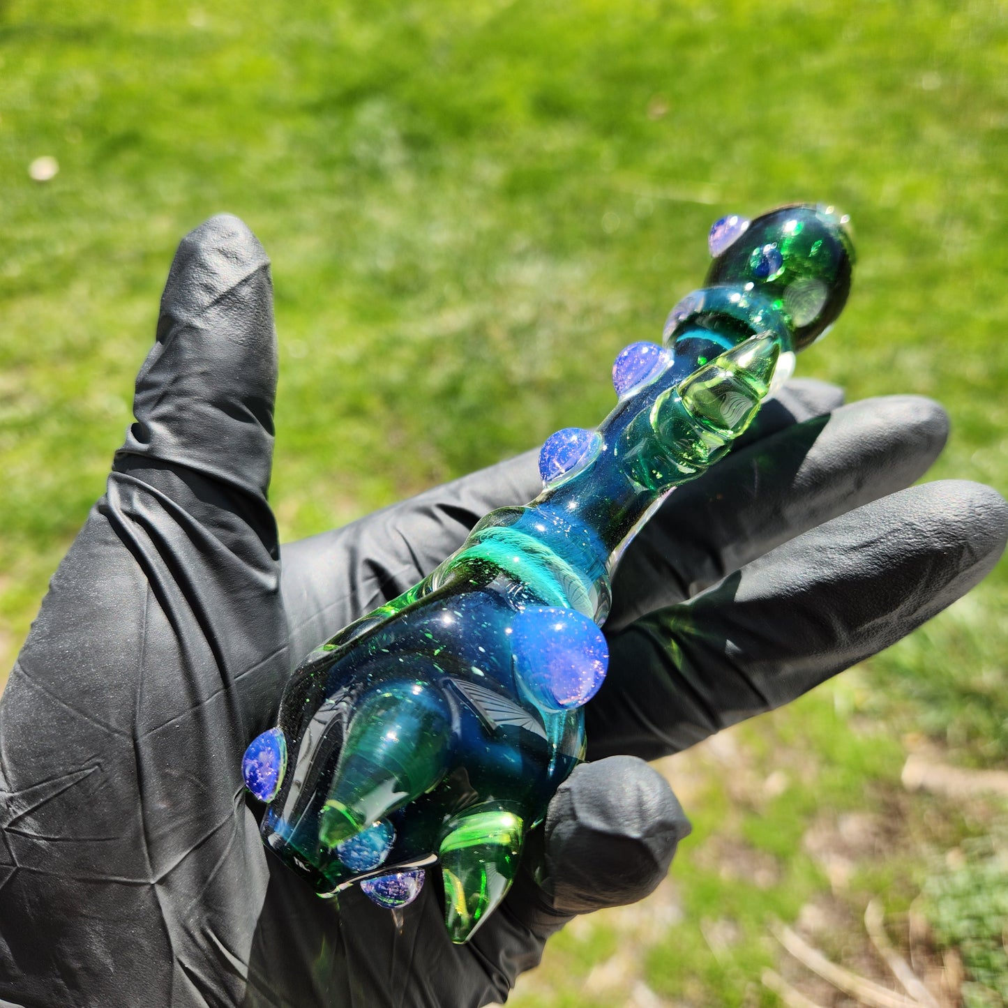 Hellstar Relics “Nebula Worm” Glass Spoon Pipe – Experimental Green w/ Multi Horn Front, Carved Side Horns & Purple Slime Accents