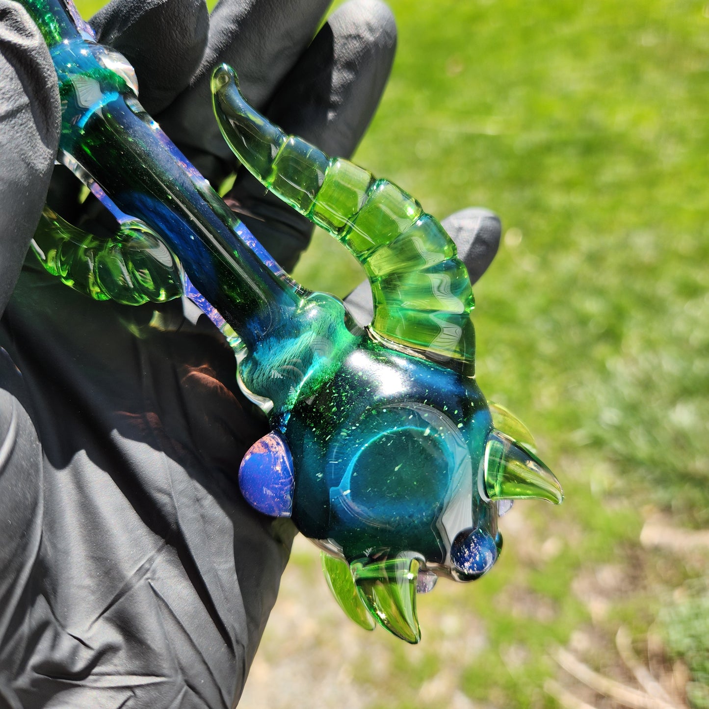 Hellstar Relics “Nebula Worm” Glass Spoon Pipe – Experimental Green w/ Multi Horn Front, Carved Side Horns & Purple Slime Accents